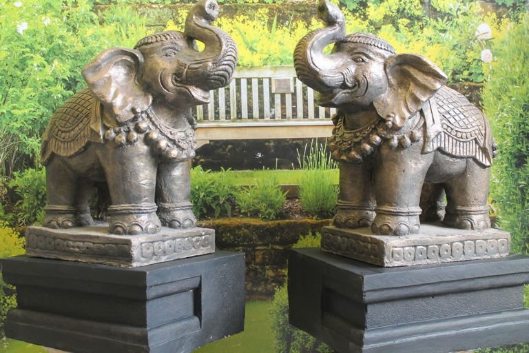 Add Charm to Your Garden With Animal Ornaments